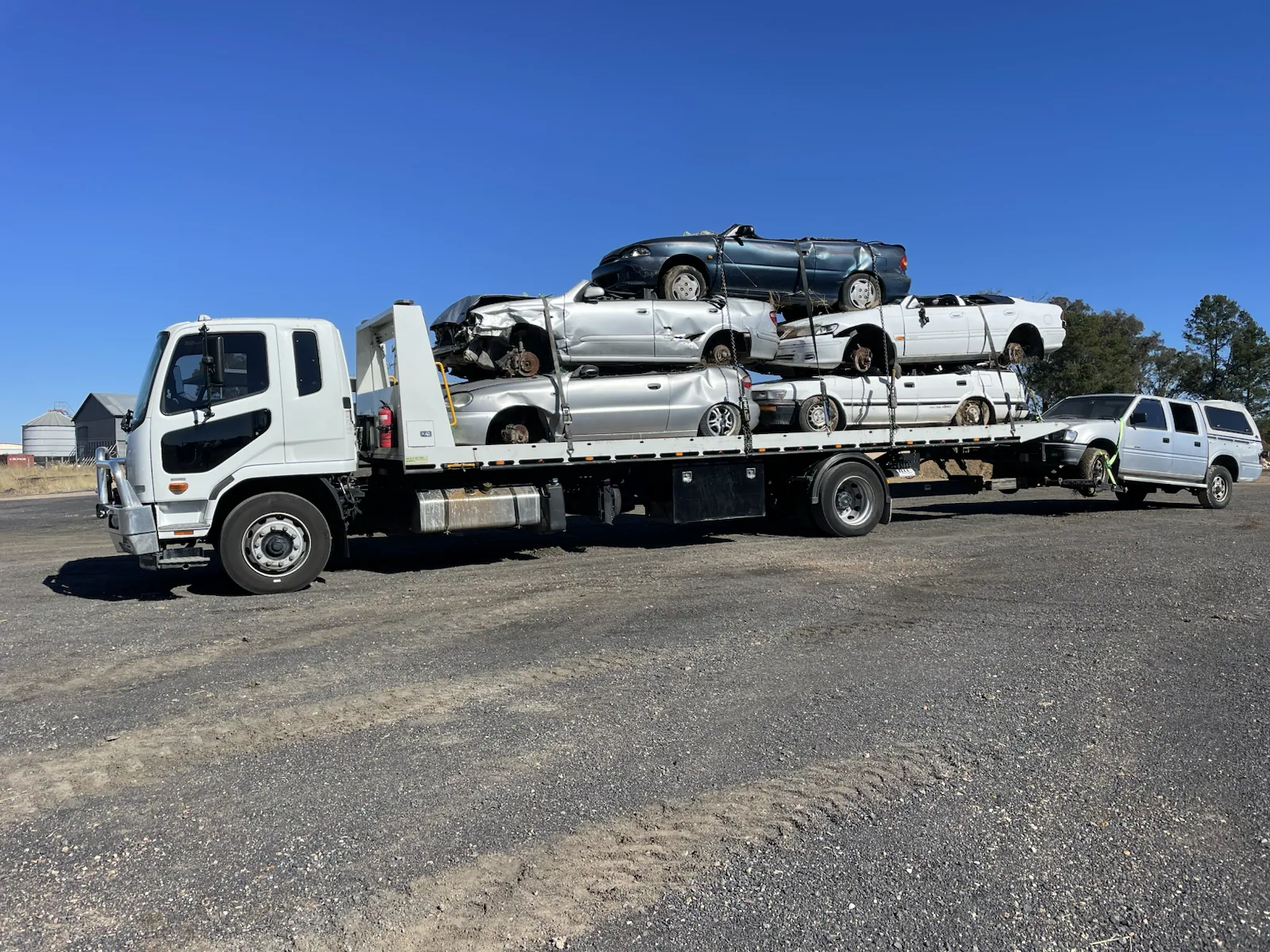 Several cars loaded on a vehicle transport truck in Queensland