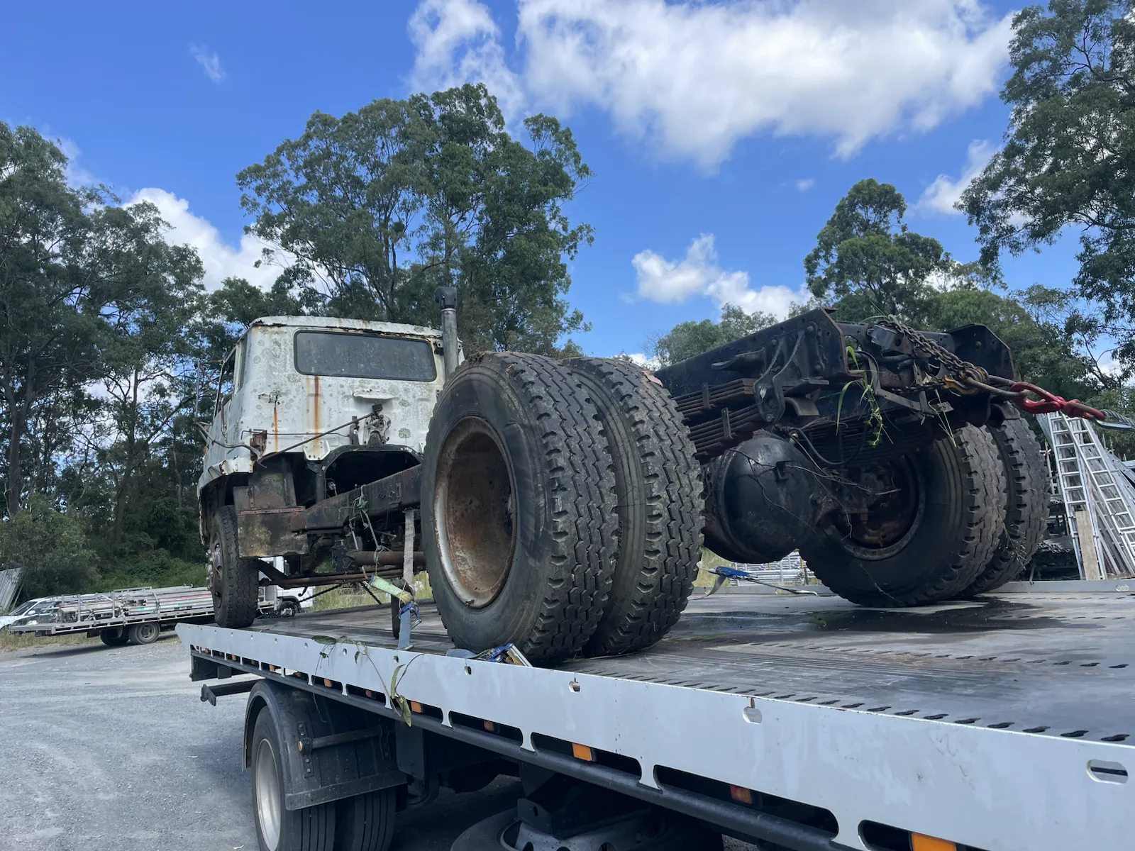 Truck chassis loaded for scrap removal in Queensland